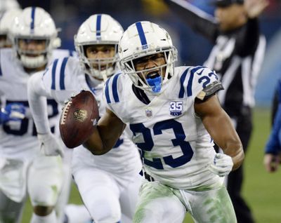 FILE - In this Dec. 30, 2018, file photo, Indianapolis Colts cornerback Kenny Moore (23) celebrates after intercepting a pass against the Tennessee Titans in the second half of an NFL football game in Nashville, Tenn. Moore has agreed to a four-year contract extension with the Colts. He told reporters he was “speechless” following the Colts’ final offseason workout Thursday, June 13, 2019. (AP Photo/Mark Zaleski, File) ORG XMIT: NYDD203 (Mark Zaleski / AP)