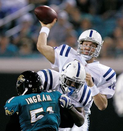 Colts quarterback Peyton Manning completed his first 17 passes against Jacksonville.  (Associated Press / The Spokesman-Review)