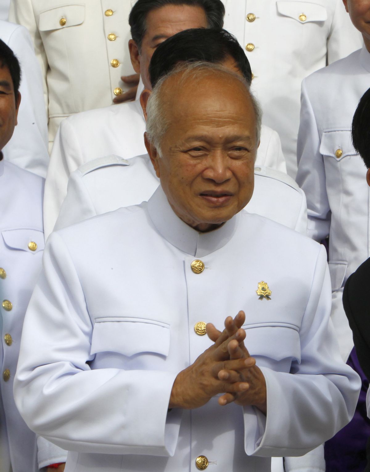 Prince Norodom Ranariddh and the royal FUNCIPEC Party walks together at the National Assembly, in Phnom Penh, Cambodia, Tuesday, Nov. 28, 2018. Ranariddh, former prime minister and the son of the late King Norodom Sihanouk, died Sunday, Nov. 28, 2021 in France, Information Minister Khieu Kanharith announced on his Facebook page. He was 77.  (Heng Sinith)