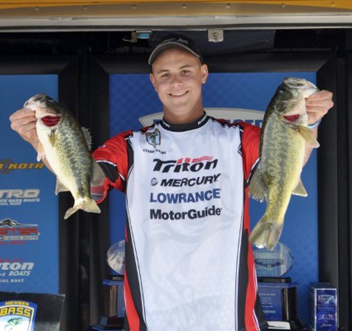 Chase Heaton of Spokane Valley poses with two of the five fish he caught on April 12, 2013, to win the B.A.S.S Nation Western Divisional Junior Championship held at Clear Lake, Calif., and a berth to B.A.S.S. World Championships set for October in Arkansas. 

