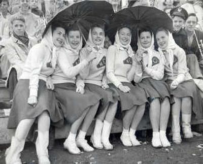 
A group of cheerleaders from North Central High School huddle under umbrellas in the fall of 1943. Photo courtesy of North Central High School
 (Photo courtesy of North Central High School / The Spokesman-Review)