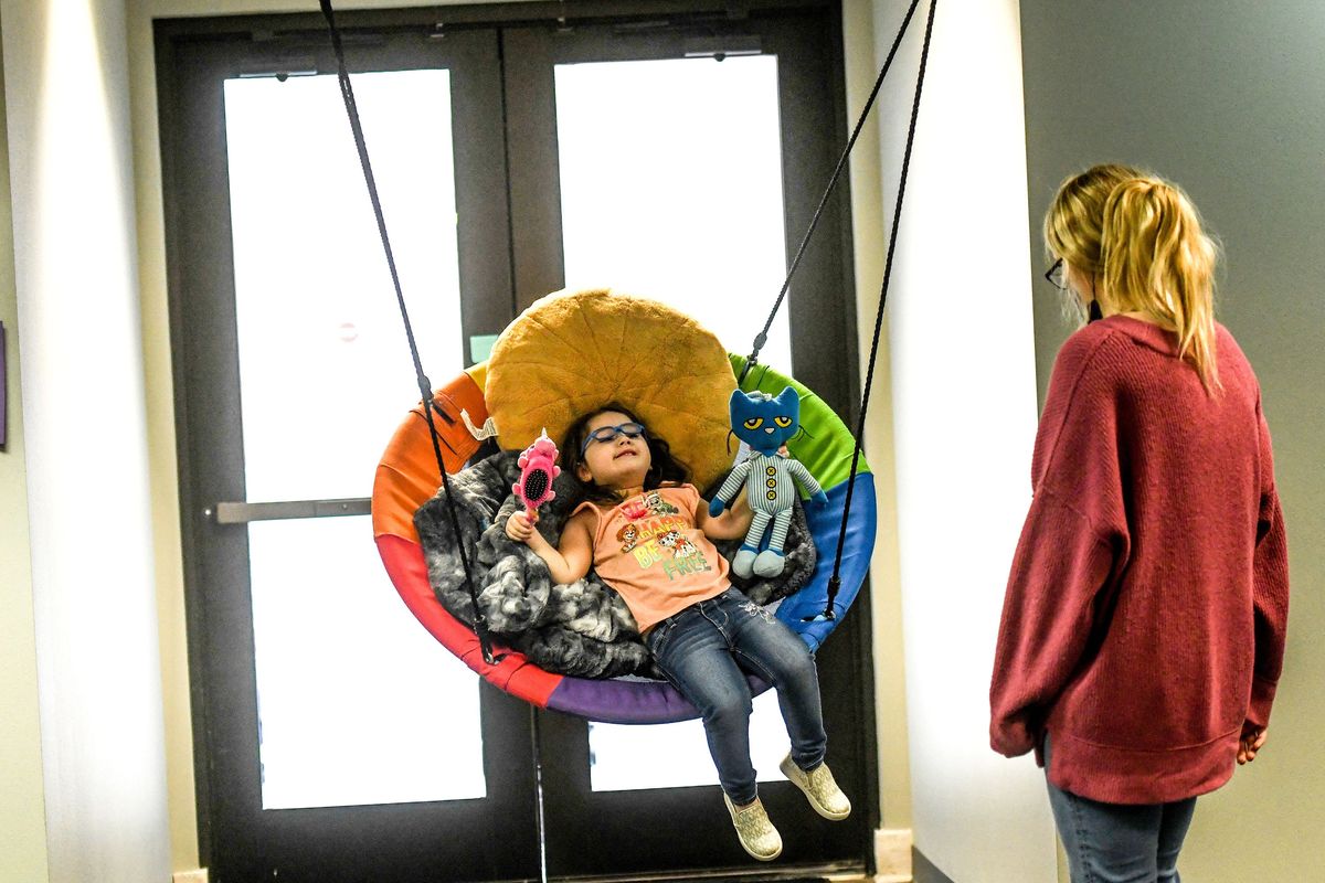 Therapist Ashley Barthels works with Four-year-old Savannah at Ascend Academy in Spokane on Tuesday, Nov. 30, 2021.  (Kathy Plonka/The Spokesman-Review)
