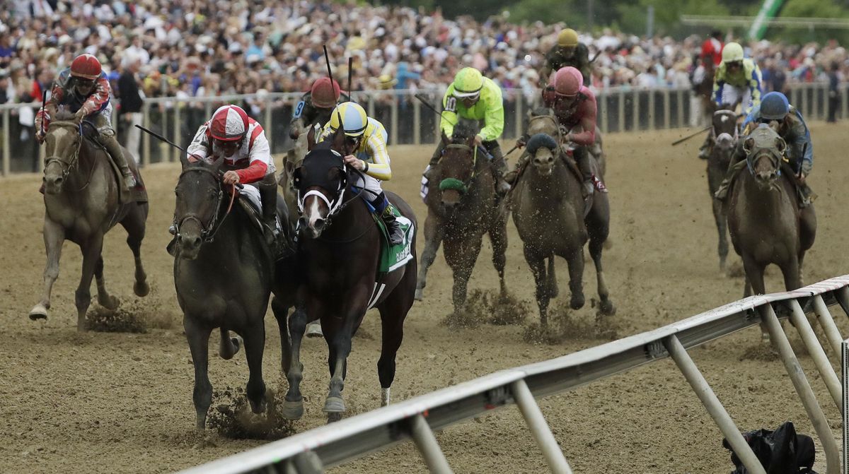 Cloud Computing (2), ridden by Javier Castellano, second from left, wins142nd Preakness Stakes horse race at Pimlico race course as Classic Empire (5) with Julien Leparoux aboard takes second, Saturday, May 20, 2017, in Baltimore. (Matt Slocum / Associated Press)