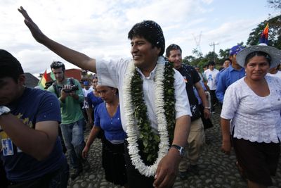 President Evo Morales walks with supporters Saturday in the coca region of Chapare.  (Associated Press / The Spokesman-Review)