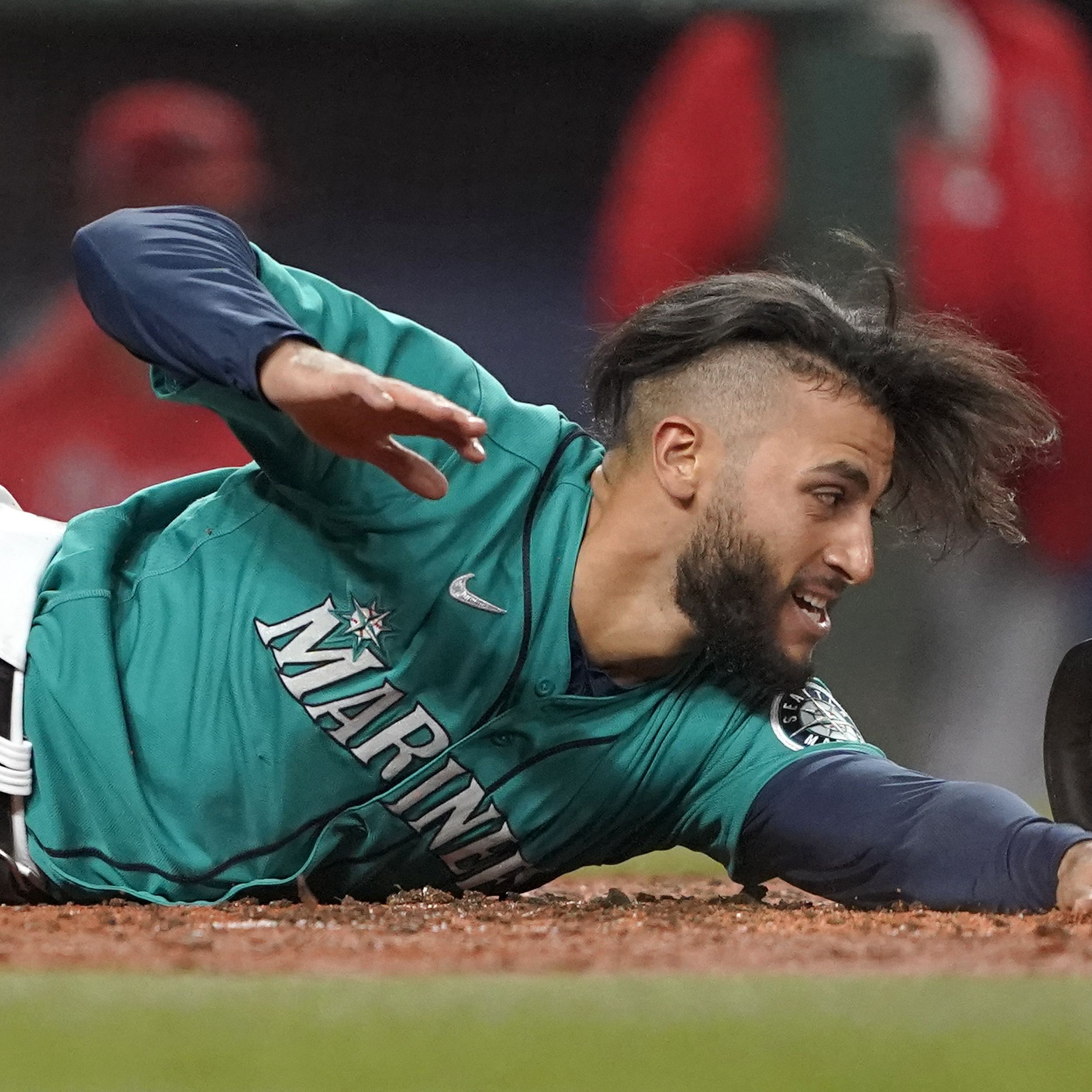 A Grip on Sports: When Toro and Moore come up big, Mariner fans say thanks  and wonder how an improbable win actually happened