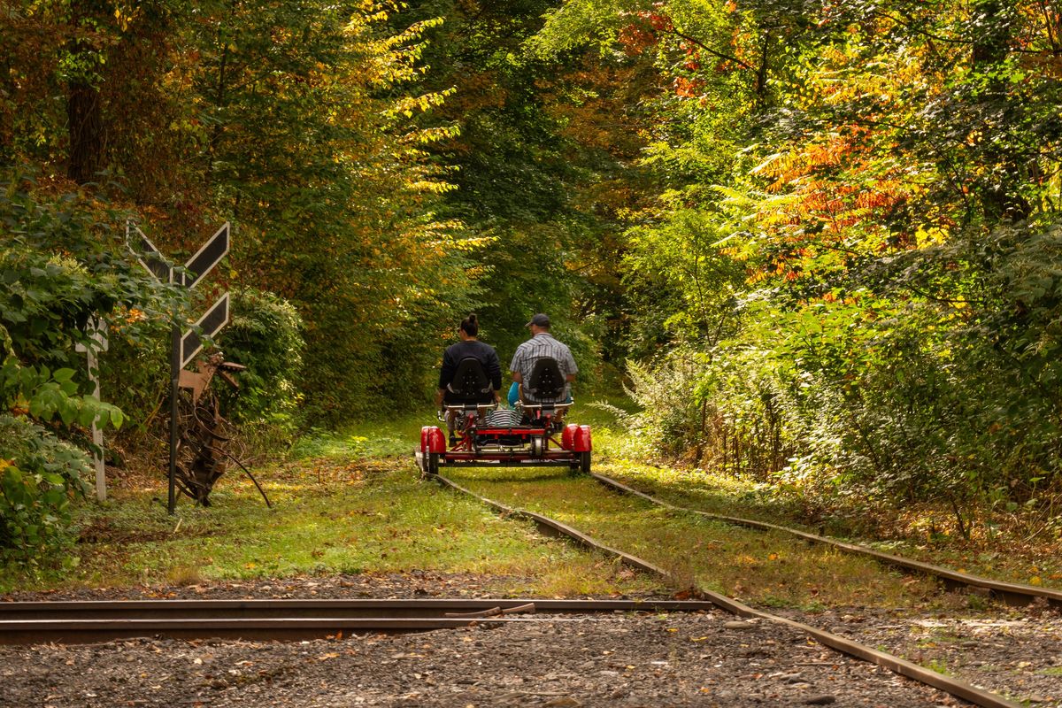 Rail Explorers runs railbiking excursions along tracks in Phoenicia, N.Y., on Oct. 3, 2024. Railbiking uses specially designed vehicles that are pedaled along disused railway lines.  (New York Times)