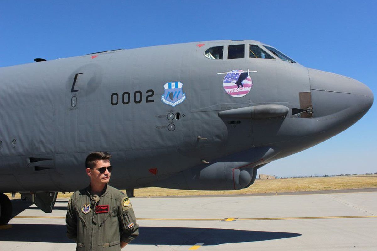 1st Lt. Tanner Devotie stands in front of a B-52 bomber at Fairchild Air Force Base, on August 17, 2022. Four B-52 bombers landed at Fairchild on August 16, 2022 to participate in Barksdale Air Force Base’s Agile Combat Employment (ACE) exercise. ACE exercises enhance U.S Air Force airpower survivability and reliance.  (Sidiq Moltafet/The Spokesman-Review)