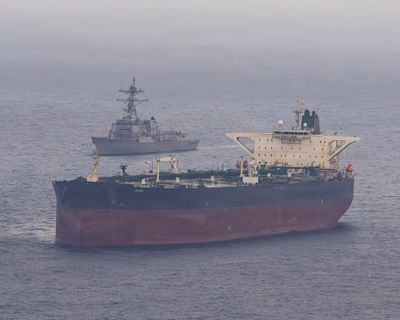Arleigh Burke-class guided-missile destroyer USS Rafael Peralta (DDG 115) enforces a maritime blockade against an Iranian-flagged ship attempting to sail toward an Iranian port, April 24, 2026.   (U.S. Navy)