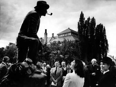 
Kathryn Crosby looks on at the dedication of a Bing Crosby sculpture on the campus of Gonzaga University in 1981. 
 (File / The Spokesman-Review)