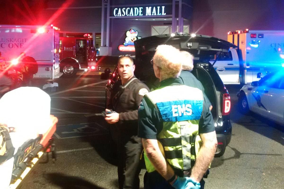 EMS starting to attend to injured inside Cascade Mall in Burlington with police escort following a shooting that left four people dead on Friday, Sept. 23, 2016. (Sgt. Mark Francis Washington State Patrol)
