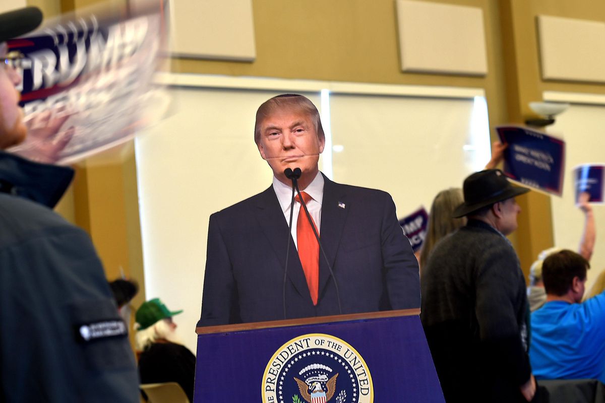 A life-size portrait of President Donald Trump stands in the entryway of CenterPlace in Spokane Valley during the Spirit of America Rally on Saturday, March 4, 2017. (Kathy Plonka / The Spokesman-Review)