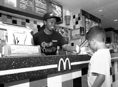 
Many teenagers want more than a paycheck and consider jobs working at a fast-food restaurant a last resort.
 (Associated Press / The Spokesman-Review)