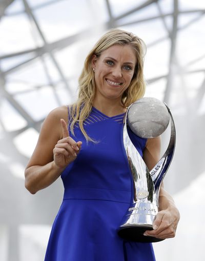 Angelique Kerber, of Germany, poses with the WTA No. 1 trophy. (Darron Cummings / Associated Press)