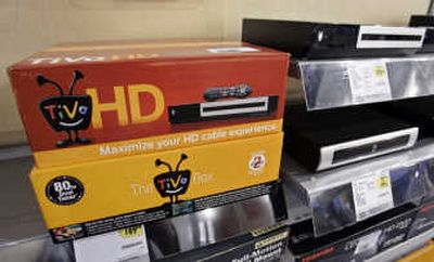 Two types of TiVo recorders are on display at Best Buy in Mountain View, Calif. TiVo Inc. disappointed investors with a wider-than-expected $17.7 million net loss for its fiscal second quarter. Associated Press
 (Associated Press / The Spokesman-Review)