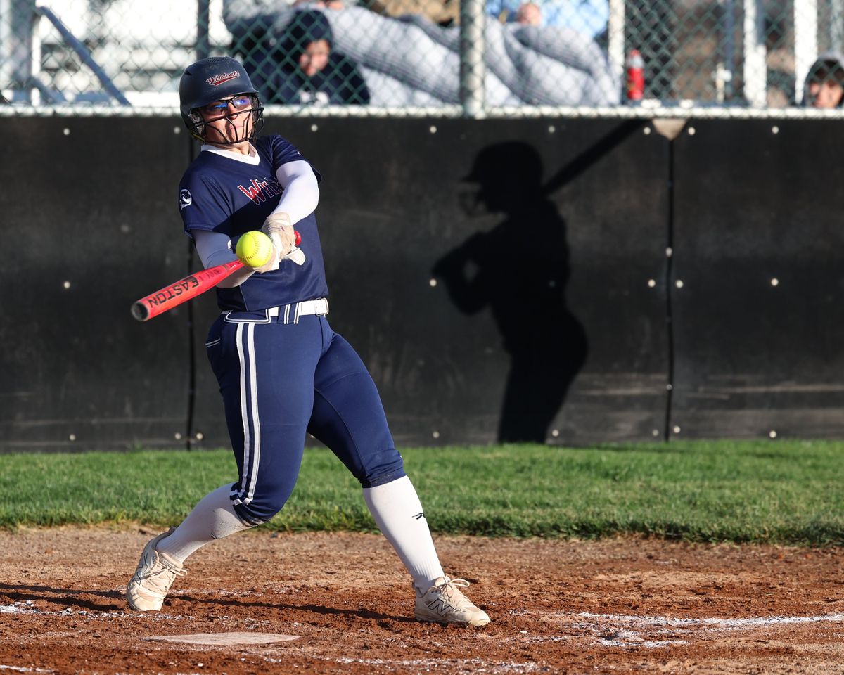 Quincy Schuerman of Mt. Spokane takes a ball deep for a two-run home run for the Wildcats in the bottom of the fourth inning of the State 3A/2A championship game against University at West Valley High School in Yakima on Oct. 25, 2025. (Sean Carter/S. Carter Action Images)