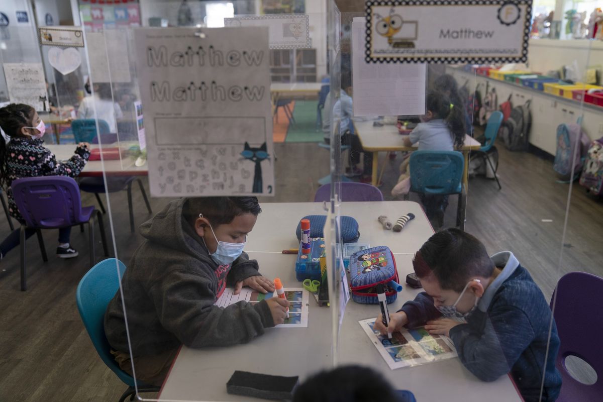 Pre-kindergarten students work on their school work on March 18 at West Orange Elementary School in Orange, Calif.  (Jae C. Hong)