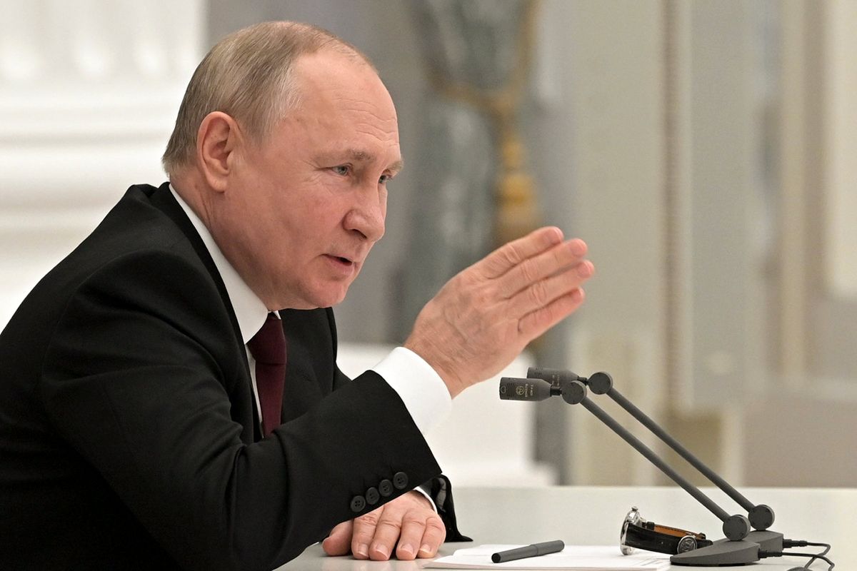 Russian President Vladimir Putin speaks during a Security Council meeting in the Kremlin in Moscow, Russia, Monday, Feb. 21, 2022. Putin has convened top officials to consider recognizing the independence of separatist regions in eastern Ukraine. Such a move would ratchet up tensions with the West amid fears that the Kremlin could launch an invasion of Ukraine imminently.  (Alexei Nikolsky)