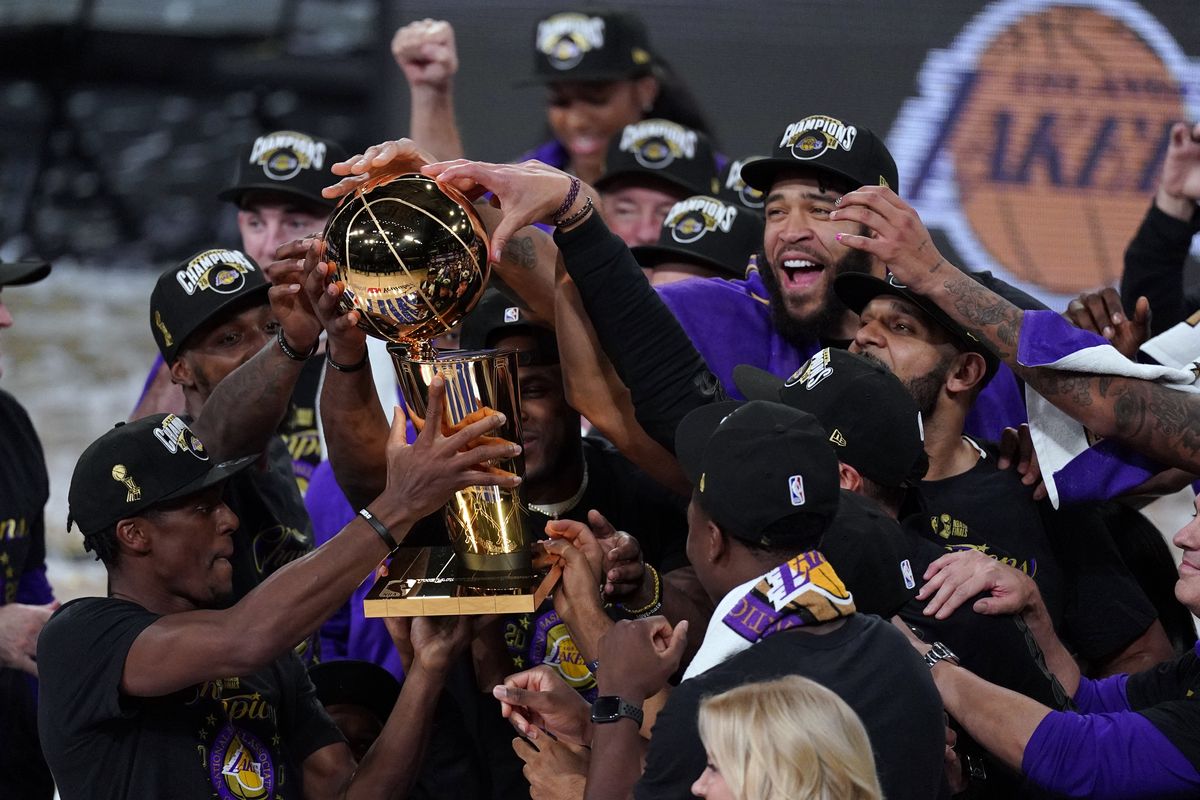 The Los Angeles Lakers players celebrate after the Lakers defeated the Miami Heat 106-93 in Game 6 of basketball’s NBA Finals Sunday, Oct. 11, 2020, in Lake Buena Vista, Fla.  (Mark J. Terrill)
