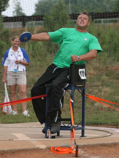 
Scott Winkler throws the discus at the U.S. Paralympic Track and Field Championships in Marietta, Ga. Associated Press
 (Associated Press / The Spokesman-Review)