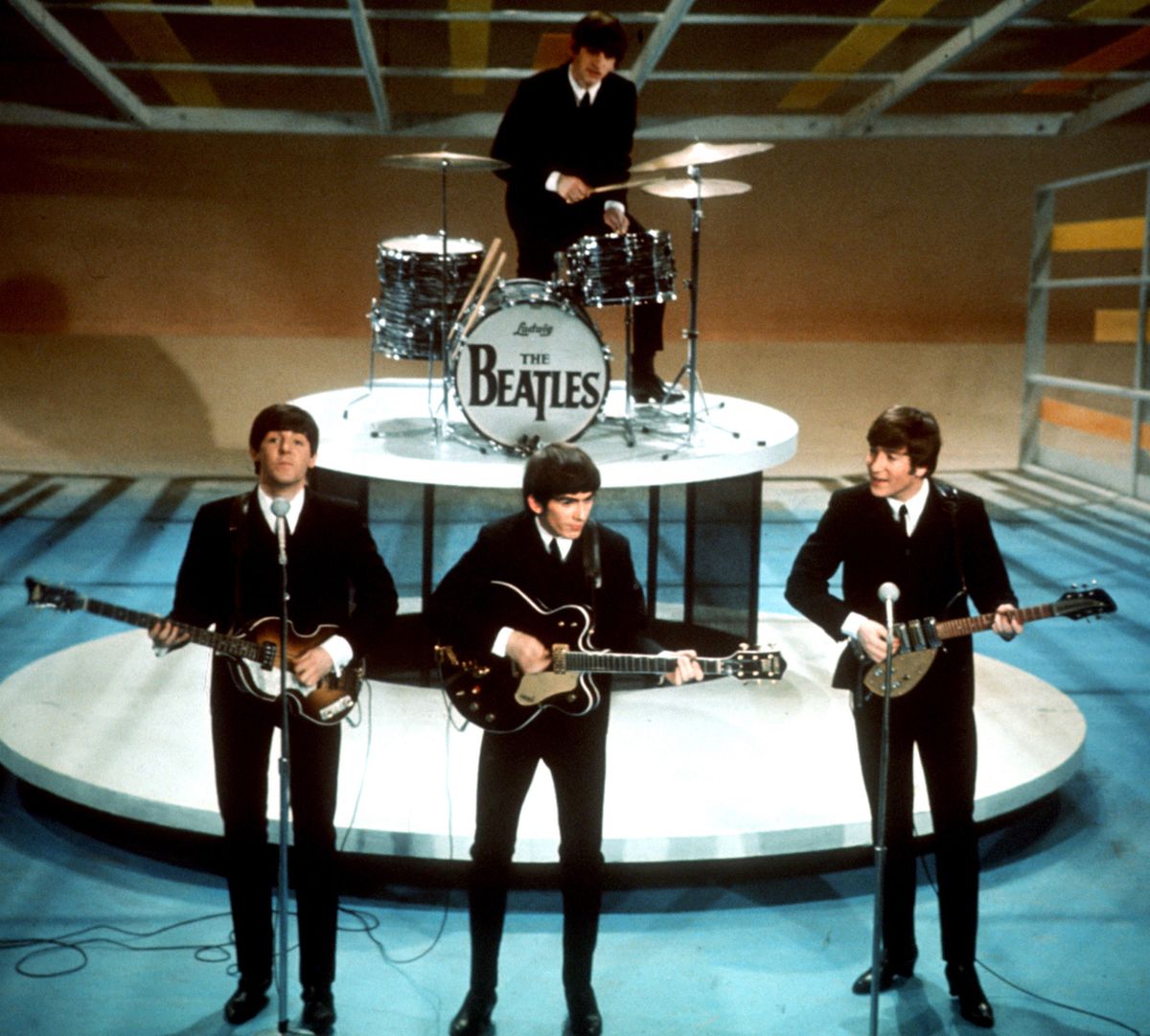 Clockwise from top, Ringo Starr, John Lennon, George Harrison and Paul McCartney, perform on CBS’ “The Ed Sullivan Show” on Feb. 9, 1964. (Associated Press)