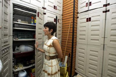 
Robin Levinson shows off her recently renovated garage by HouseWall Garage System. Companies  are helping people get the junk out of the way and let homeowners put the car back in the garage. 
 (Associated Press / The Spokesman-Review)