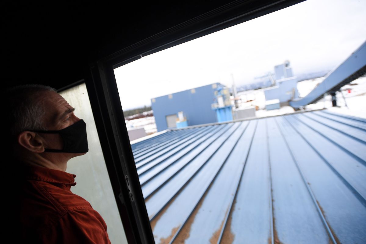 Todd Behrend, Interim Mill Manager of the Ponderay Newsprint Mill looks out over the vacant property as he gives a tour of the closed facility on Thursday, December 17, 2020, at the Ponderay Newsprint Mill in Usk.  (Tyler Tjomsland/THE SPOKESMAN-REVIEW)