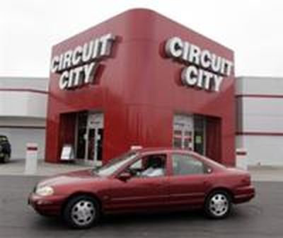 AP – In this Nov. 10, 2008 file photo, a brightly lit sign is seen at the entryway of Circuit City in S. Portland, … (The Spokesman-Review)