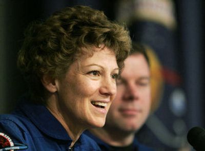 
Discovery commander Eileen Collins speaks during a news conference as pilot James Kelly looks on.
 (The Spokesman-Review)