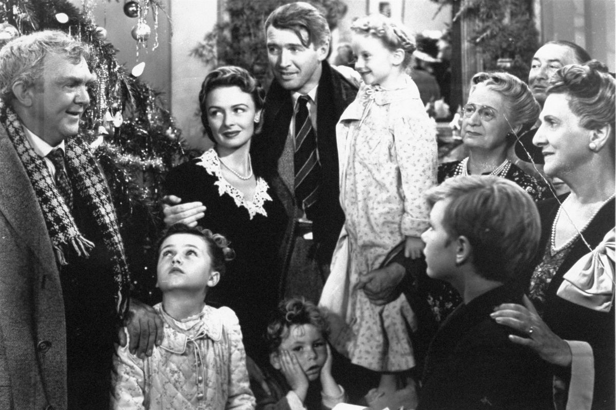 In this undated publicity still photo, James Stewart, as George Bailey, center, is reunited with his wife, played by Donna Reed, left, and children during the last scene of Frank Capra’s 1946 classic, “It’s A Wonderful Life.” NBC will broadcast the film on Dec. 12 and 24 at 8 p.m.Associated Press photos (Associated Press photos)