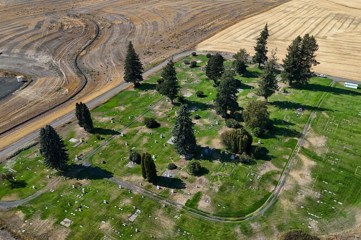The old cemetery in Spangle, Washington is managed by a cemetery board that struggles to keep up with lawn care and bills for water and electricity. Photographed Friday, Sept. 19, 2025.  (Jesse Tinsley/THE SPOKESMAN-REVI)