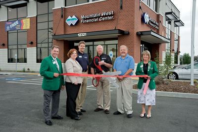 From left, John Pederson, Greater Spokane Valley Chamber ambassador; Ginnie Peterson, Mountain West Bank branch manager; Russ Porter, Mountain West Bank president and chief operating officer; Jon Hippler, Mountain West Bank CEO; Richard Munson, Spokane Valley mayor; and Vicki Johnson, Greater Spokane Valley Chamber ambassador, are shown during a ribbon-cutting ceremony for the new facility.QuicksilverCommercial.com (Joel Riner QuicksilverCommercial.com / The Spokesman-Review)