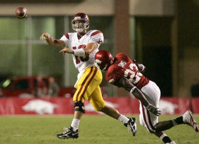 
USC quarterback John David Booty has completed at least 24 passes in all three Trojans games thus far.
 (Associated Press / The Spokesman-Review)
