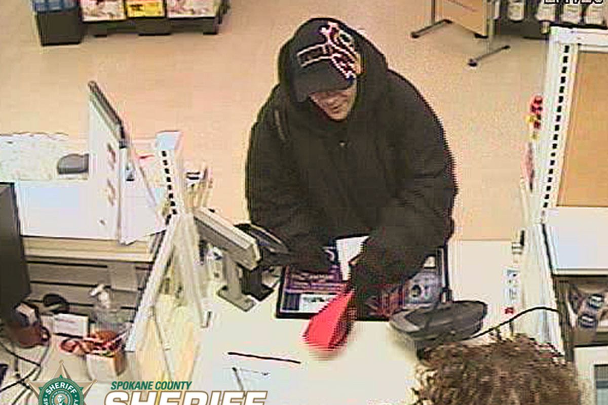The Spokane County Sheriff's Office is seeking help identifying this man, suspected of robbing an Albertson's pharmacy on Feb. 7. (Spokane County Sheriff's Office)