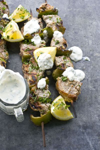 Grilled herbed Greek lamb kebabs pack flavor. (Associated Press)