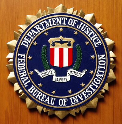 Logo of the Federal Bureau of Investigation of the Department of Justice of the United States of America pictured at the embassy of the USA in Berlin, Germany, Friday, Aug. 10, 2007. (MICHAEL SOHN / ASSOCIATED PRESS)