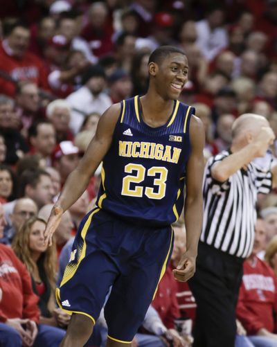 Michigan's Caris LeVert enjoys his second-half 3-point basket against Wisconsin on Saturday. (Associated Press)