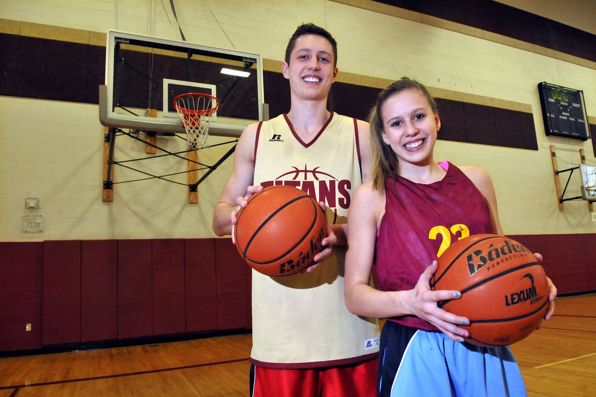 Senior Brett Bailey and his younger sister, freshman Brooke Bailey, are both playing in the state basketball tournament for University. (Jesse Tinsley)