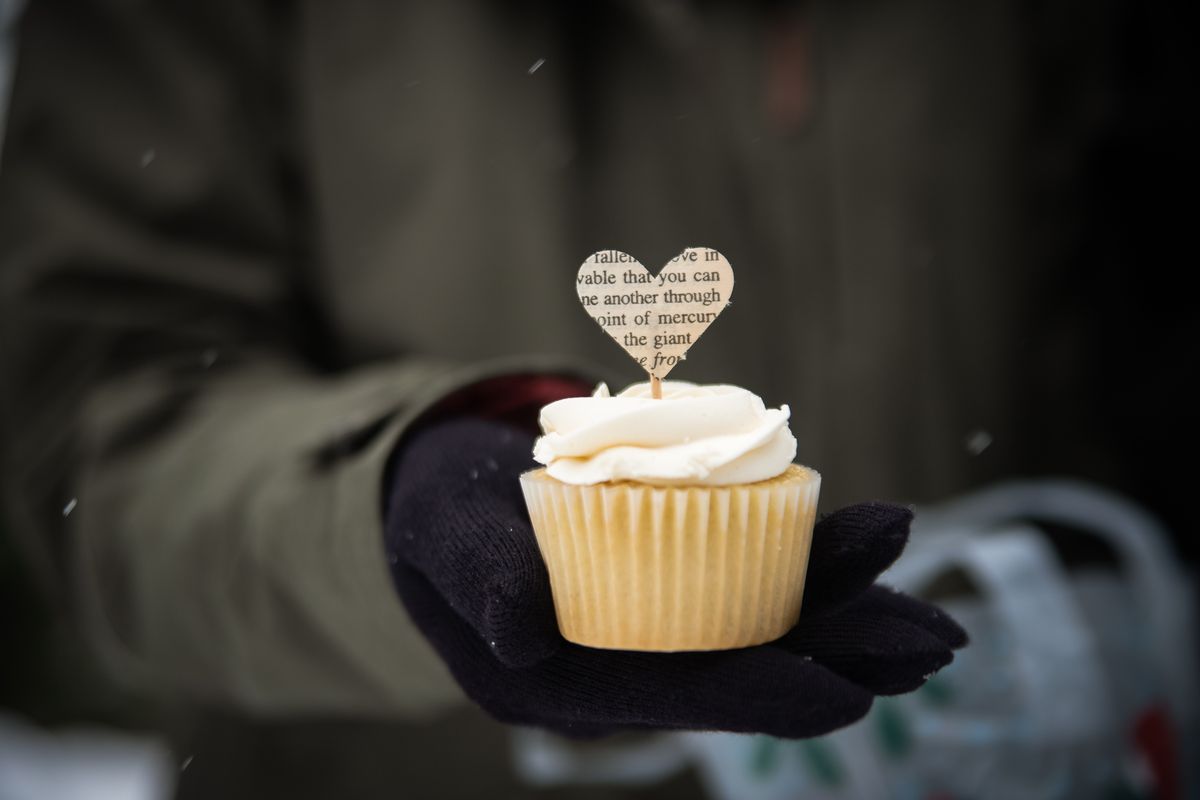 Petra Hoy holds the homemade cupcake that she had just received from a thank you gift bag provided by Ree-Lynn Barden, marketing and communications director of Volunteers of America, in Greenacres, Wash. on Dec. 15, 2020. Although the Bureau was prevented from distributing gifts for area families in its normal fashion due to the risk of COVID-19, Volunteers of America wanted to show appreciation to the volunteers who were prevented from participating in their annual roles.  (Libby Kamrowski/ THE SPOKESMAN-REVIEW)