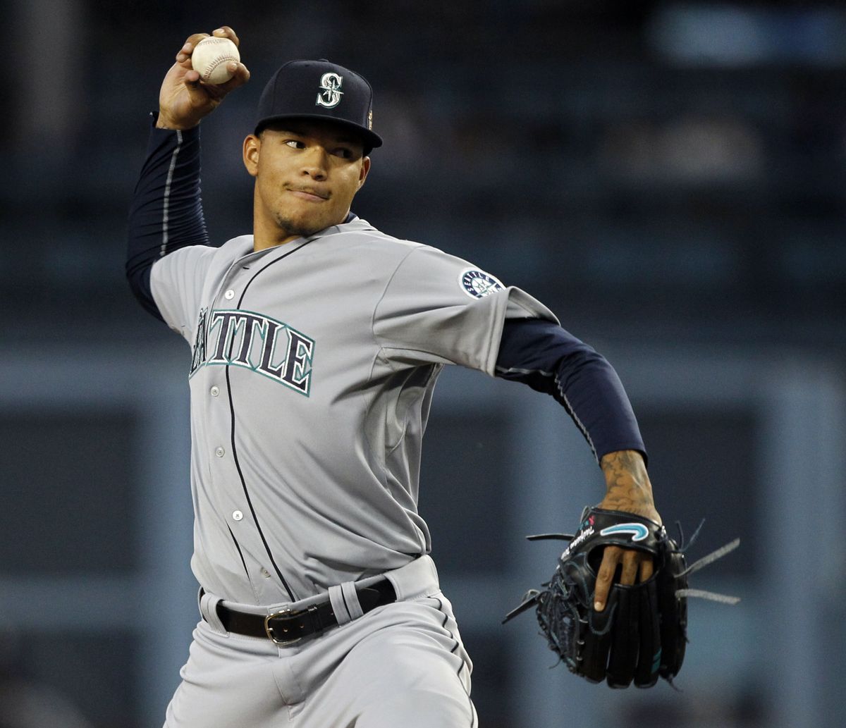 Mariners starting pitcher Taijuan Walker was roughed up in Los Angeles, lasting only 4 innings. (Associated Press)