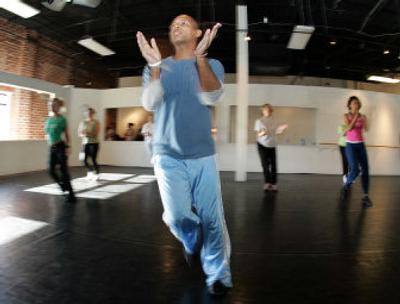 
Dance instructor David Norwood leads a dance class in Atlanta as more Americans are using dance to stay in shape. You can take a break from vigorous exercise, but not for long. When habits of exercise and proper nutrition change, so does your body.
 (AP / The Spokesman-Review)