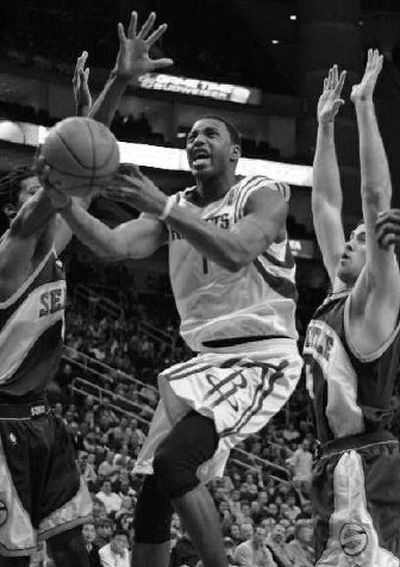 
Houston's Tracy McGrady scored 36 points to lead his team past Seattle. 
 (Associated Press / The Spokesman-Review)