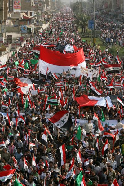 Followers of Shiite cleric Muqtada al-Sadr take part in a rally in Baghdad on Saturday to protest a  security agreement that would extend the presence of American forces beyond the end of this year.  (Associated Press / The Spokesman-Review)