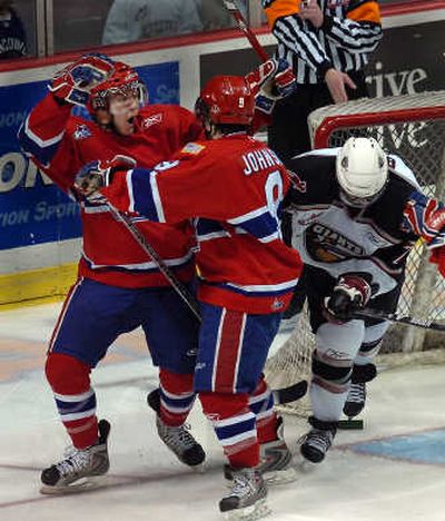 
Mitch Wahl, left, and Tyler Johnson celebrate Johnson's game-winning goal.Vancouver Sun
 (Steve Bosch Vancouver Sun / The Spokesman-Review)