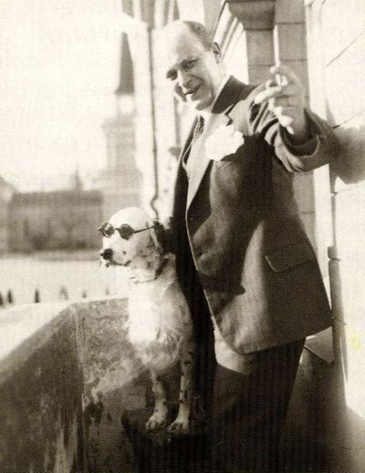 The undated photo taken from a book on the history of Finnish Tamro Group shows Tor Borg and his dog Jackie. The dog was dubbed Hitler by Borg's wife as it raised its paw for the Nazi salute. The Nazis started an investigation against the dog's owner, a 41-year-old wholesale merchant in Finland. In the middle of World War II, the Foreign Office in Berlin commanded its diplomats in the Nazi-friendly Nordic country to gather evidence against the Hitler-saluting hound and forged plans to destroy the dog owner's existence. (AP Photo/Tamro Group image bank) (Associated Press)