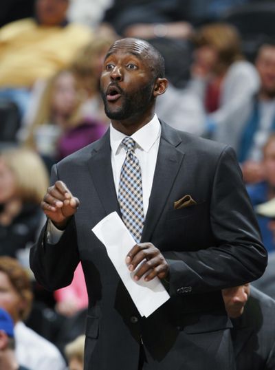 In this Jan. 1, 2014, file photo, Philadelphia 76ers assistant coach Lloyd Pierce talks to players during the team’s NBA basketball game against the Denver Nuggets in Denver. The Atlanta Hawks are giving Pierce his first head coaching job in the NBA, choosing a man who has been an assistant with Philadelphia and Memphis to rebuild the franchise. The Hawks announced Friday, May 11, 2018. they had agreed to terms on a deal with Pierce. (David Zalubowski / Associated Press)