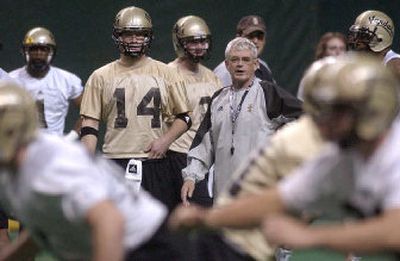 Idaho football coach Dennis Erickson talks to punter T. J. Conley at the first day of spring football at the Kibbie Dome.
(Joe Barrentine Associated Press / The Spokesman-Review)