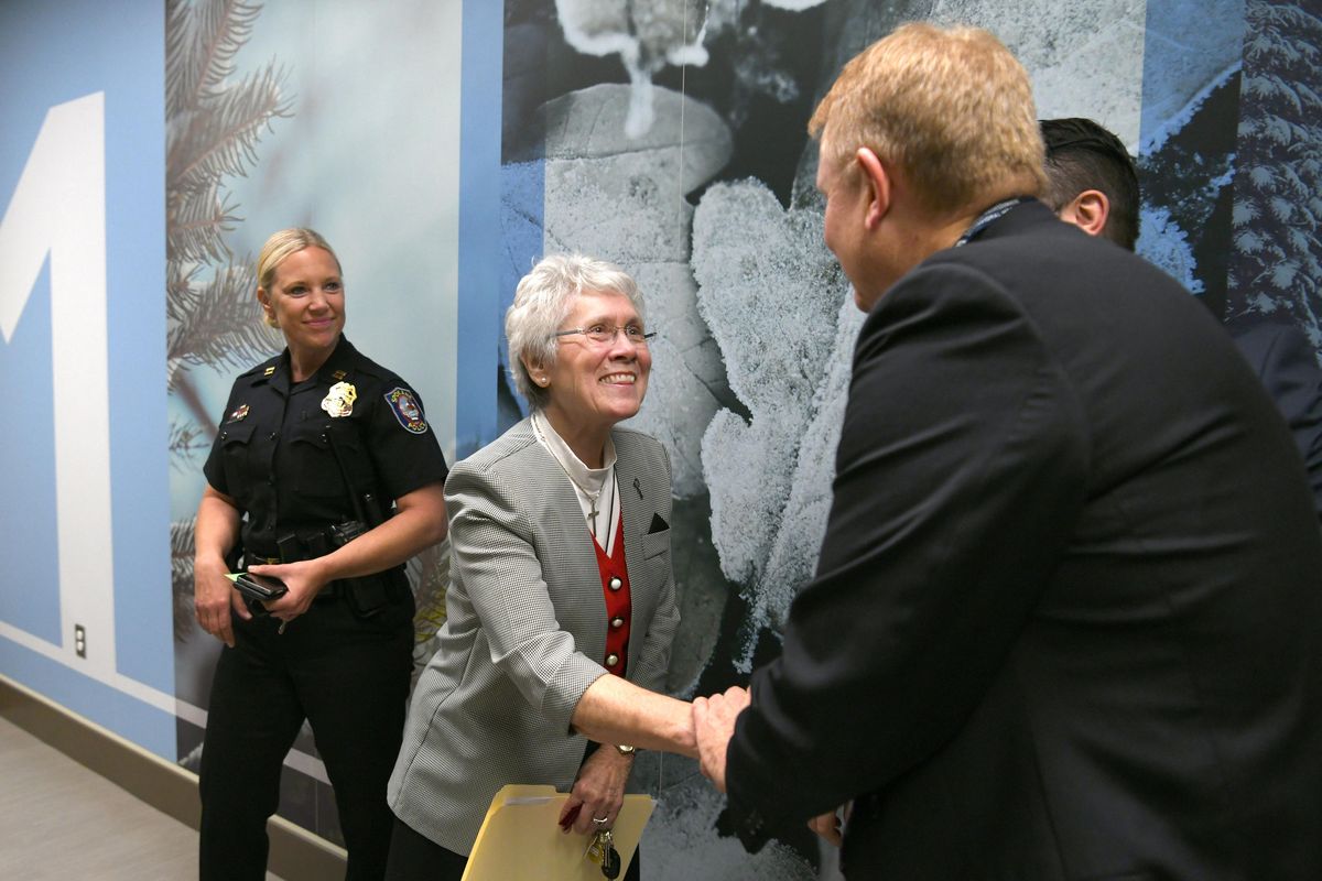 Sister Rosalie Locati of the Sisters of Providence greets Chet Roshetko, the assistant director of nursing at the new Inland Northwest Behavioral Health, a new hospital that will offer 100 new beds for patience with mental illness when it begins accepting patients next month. At left is Spokane Police Capt. Tracie Meidl, who was touring the new facility after the ribbon cutting Thursday, Sept. 20, 2018. (Jesse Tinsley / The Spokesman-Review)