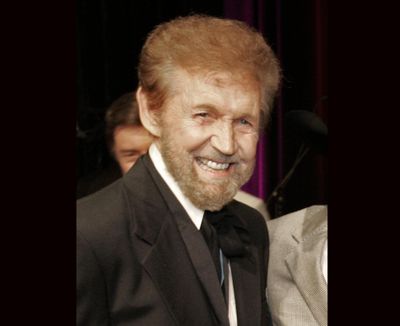 Singer Sonny James is presented with his medallion during his induction into the Country Music Hall of Fame in 2007. (Mark Humphrey / Associated Press)