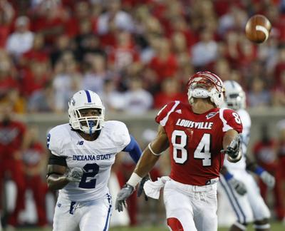 Louisville’s Scott Long is unable to catch up to a pass as Indiana State cornerback Donye McCleskey (2) tracks him during a game on Sept. 5.   (Associated Press / The Spokesman-Review)