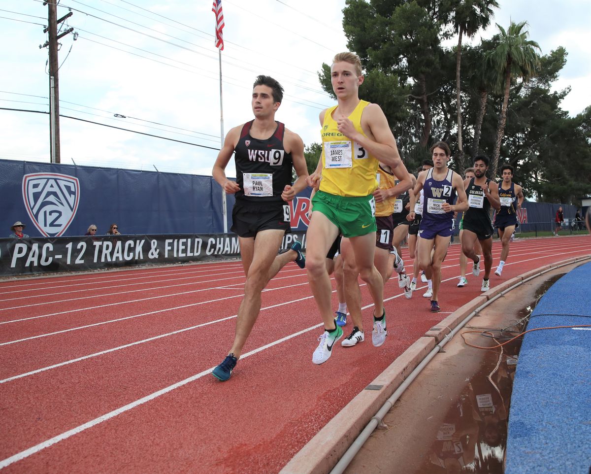 Washington State’s Paul Ryan, left, broke the 4-minute-mile mark during the 2018-19 indoor season at the MPSF Championships.  (Courtesy of Pac-12)